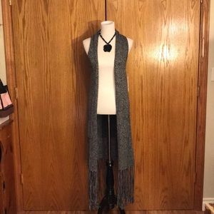 Long, fringed, two pocketed sweater vest